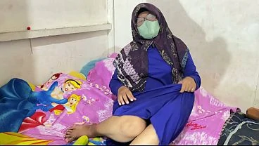 Hijab wearing woman masturbating