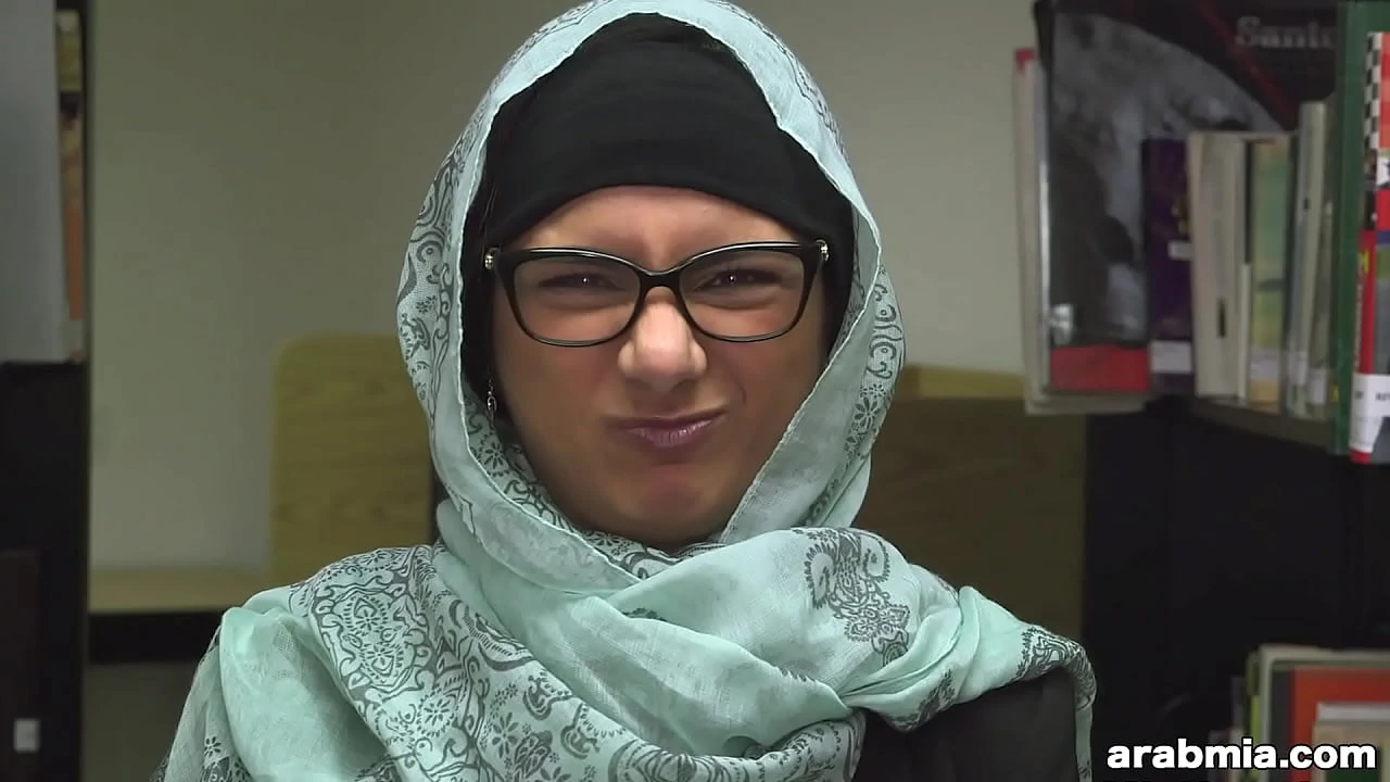 Mia Khalifa Takes Off Hijab and Clothes in Library mk